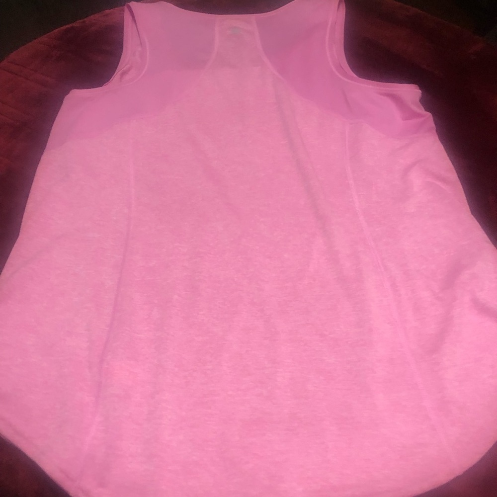 Like new worn once. Is in great condition. Great work out shirt or everyday wear